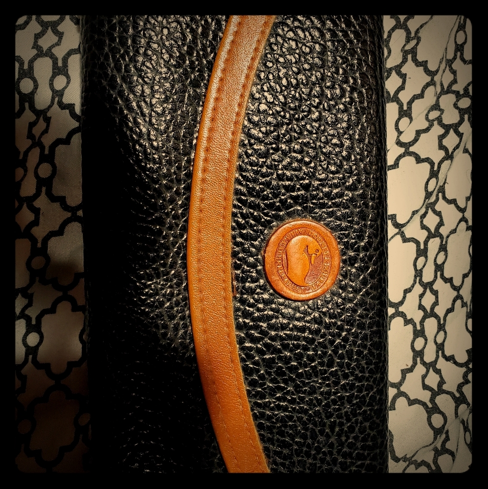 Dooney and Bourke black leather pebbled wallet